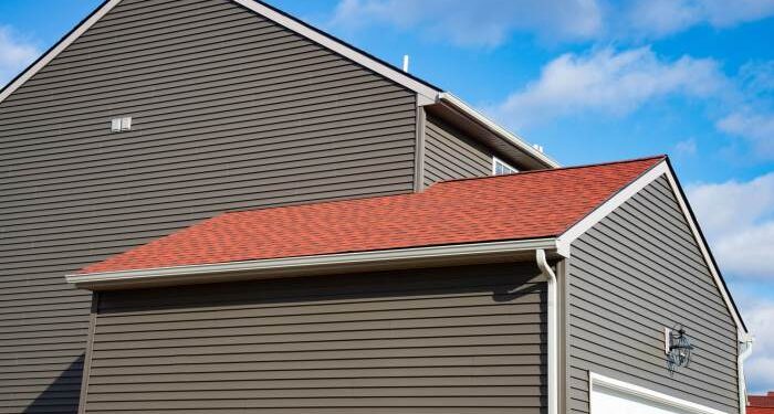 Stucco Vs. Vinyl Siding: Key Differences Compared - Monastery Roofing ...